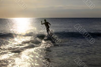 Surfer on sunset