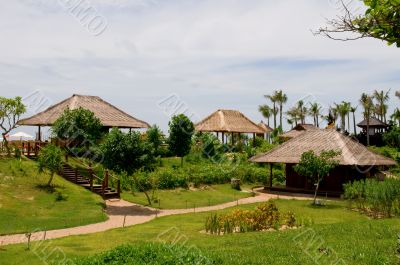 Huts over field