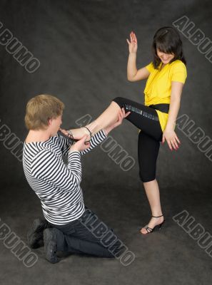 Man kisses to the lady a foot