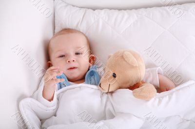 Baby with teddy