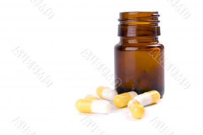 bottle with yellow capsules