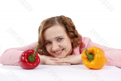 Young woman with sweet peppers.