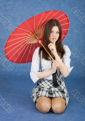 Beautiful girl with the Chinese umbrella