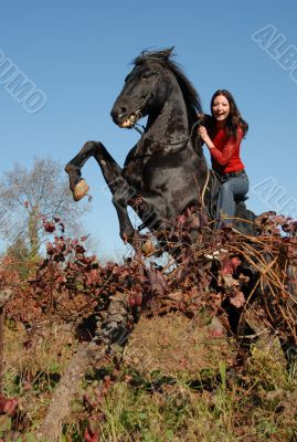 rearing stallion and happy girl