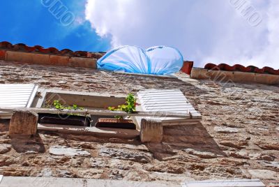 Blue curtain on wind
