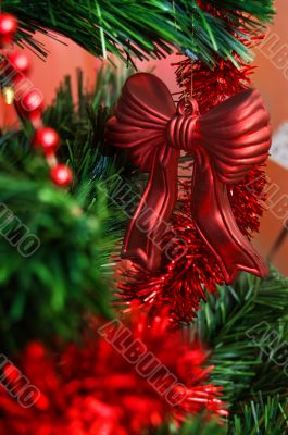 Christmas toy on branch