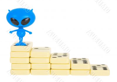Toy alien on a ladder from dominoes