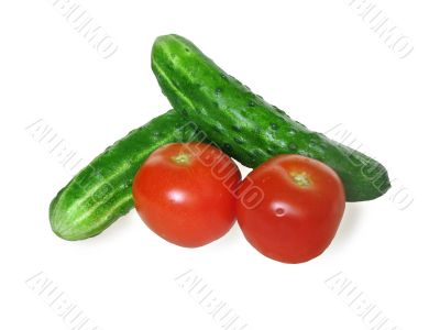 Tomatoes and cucumbers isolated on a white