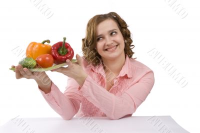 Woman with vegetables.