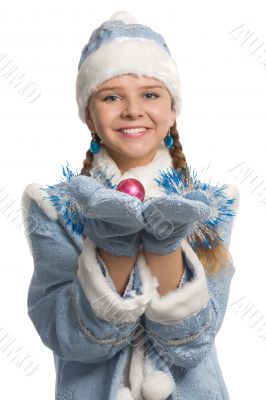 Smiling snow maiden showing christmas-tree decoration
