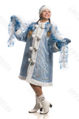 Happy girl in snow maiden fur coat with tinsel