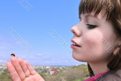 Girl and ladybird