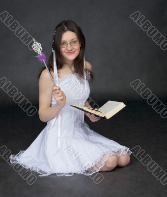 Girl - the magician with the book