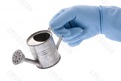blue rubber glove with watering can