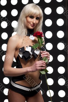 Young attractive girl with rose