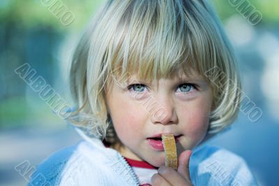 Little girl with bread
