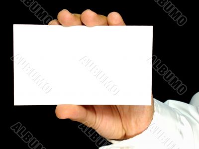 card in hand with black background 20509