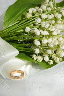 Lily-of-the-valley and wedding ring