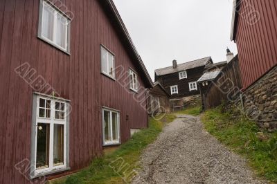 Footpath between wooden houses