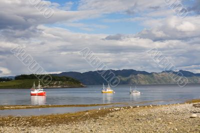 lake with fishing boats