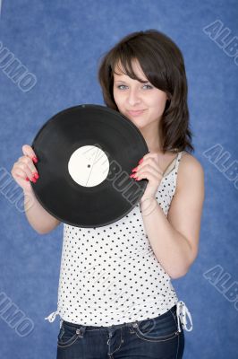 Portrait of the girl with a phonograph record