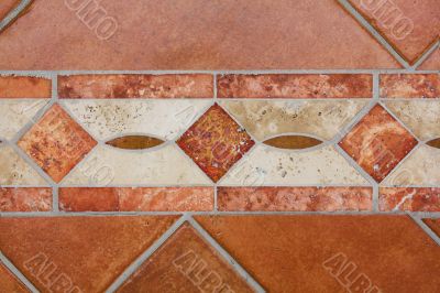 Decorated floor tiles