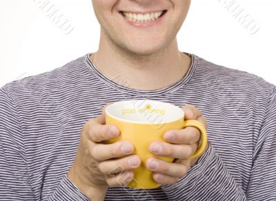 man with a yellow cup