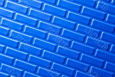 Wall of metallic bricks