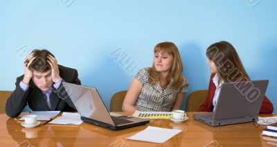 Businessman has fallen asleep sitting at meeting