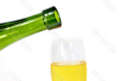 Pouring some white wine in glass