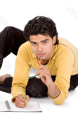 Man playing with colorful pencil