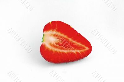 Strawberry cut in half on white background