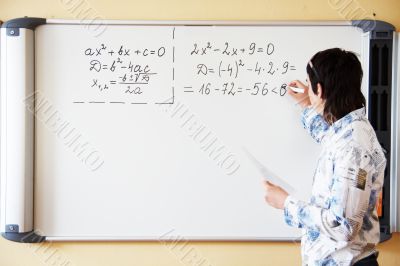 Teacher teaching algerbra