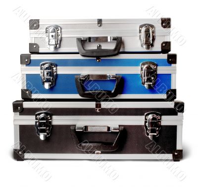 three isolated suitcases