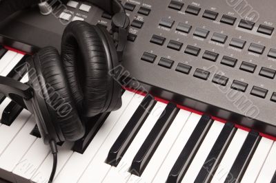 Headphones Laying on Electronic Keyboard