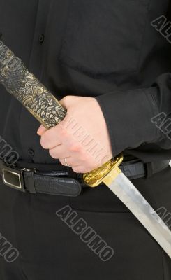 Sword in male hand
