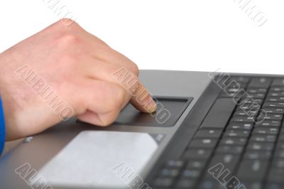 Male hand on laptop
