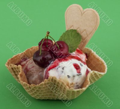 Fruit sundae with cherry on waffle