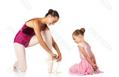 Tying ballet shoes