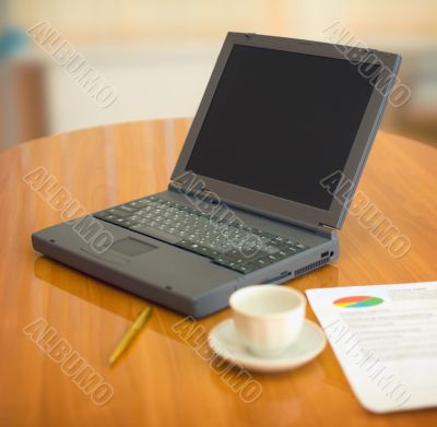 Laptop on a table at office