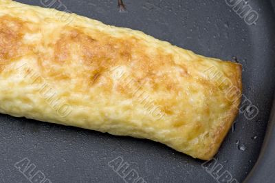 cooking chiken roll closeup