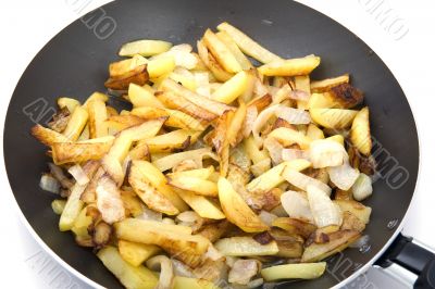fried cutting potatoes in griddle