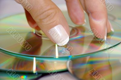 woman hand over CD
