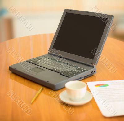 Laptop on a table at office