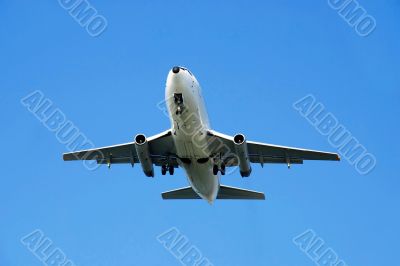 Plane over blue sky