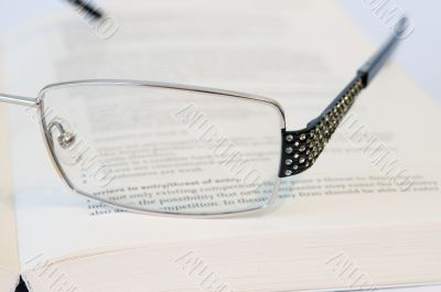 Glasses with book close-up