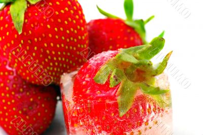 One strawberry into ice