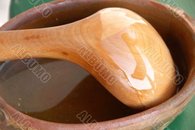 Wooden spoon in earthenware