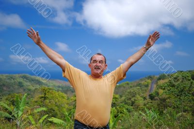 Happy man against the sky