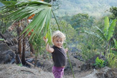 The little girl played in jungle